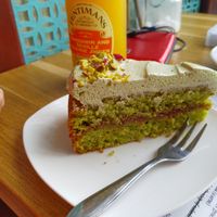 Pistachio cake with raspberry jam and matcha frosting at Koffie ende Koeck in Amsterdam