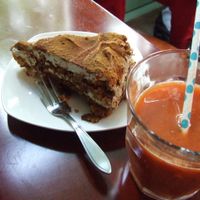Tiramichai cake and a glass of carrot/pear/ginger juice  at Koffie ende Koeck in Amsterdam