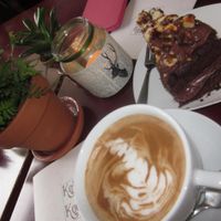 Delicious chocolate & nuts cake with chai latte at Koffie ende Koeck in Amsterdam