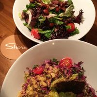 Kale Caesar (bottom) and green salad (top) at Shore Diner in Sarasota