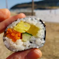 Hamdeok beach is just down the road. Buy your veggie Kimbap and go enjoy it at the beach. at Gim Yeosane - 김여사네 in Jeju