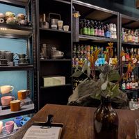 Different things on sale/cake cabinet etc at the front at Hinterland Alcohol-Free Bar and Cafe in Manchester