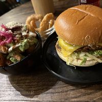 Truffle Burger with onion rings and Pesto Tots  at Hinterland Alcohol-Free Bar and Cafe in Manchester