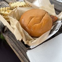 Sorry for the bad angle. Vegan BBQ cheese burger with onion rings and bacon. Great fry sauce too!!!!  at Happy Vegan in Garland