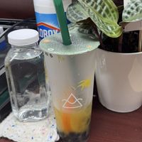 Orange Green Tea (Sorry… It is almost all drank but it shows the fresh fruit!)   at OMOMO Tea Shoppe in San Diego