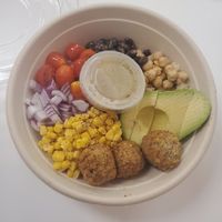 cauliflower rice, falafel, avocado, tomato, corn, black beans, onion, and cilantro lime vinaigrette. at Goodness Bowls  in Collegeville
