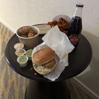 Greasy ‘chicken’ burger, floppy cold SPFs, poor tasting cauliflower bites and dodgy coke.   at HipCityVeg - University City in Philadelphia