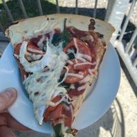 This is HALF of one slice! The Goat in the Garden with vegan cheese. Delicious.  at Bottoms Up Pizza in Richmond
