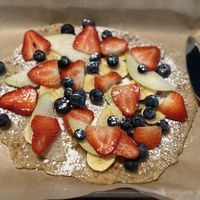 Vegan roti with fruit  at Aman Cafe in Oakland