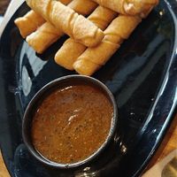 Vegan cheese sticks with pesto like tomato sauce at Yummy Brunch in Malaga