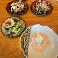 Menu: 3 side dishes (next to the ramen): futomaki sushi, potato noodle salad, tofu sesame mushroom salad  at Vegan Ramen YADOKARI in Fukuoka