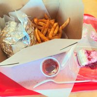 Good portions. Large sandwich and way more fries than it looks like. Awesome cheesecake 😋 at Rhythm 'n Wraps in Boston