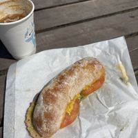 Vegan cheese, tomato and pesto ciabatta with soya iced latte   at Life's a Beach in Falmouth