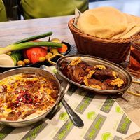 Syrian foul, makdous, raw vegetables, pita. at Baba Ghanouj - Al Barsha in Dubai