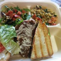 Delicious portobello mushroom sandwich with salad, brown rice at The New Vegan in Delray Beach