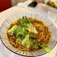 Soupe de nouilles épicée aux légumes   at Tintin - Bastille in Paris