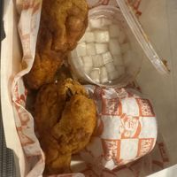 Original meal comes with 2 “chicken” legs (deep fried breaded oyster mushrooms), pickled veggies, rice, and mushroom-based gravy.  at Taste Like Chicken in Baguio City