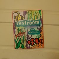 Restroom Sign at Seed - Faubourg Lafayette in New Orleans