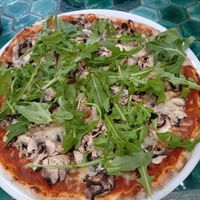 My pizza with vegan cheese, rocket and mushroom at Trattoria L'Allegria in Alvor