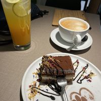 Tiramisu, lemonade and oatmilk cappuccino    at Katzentempel Berlin Mitte in Berlin