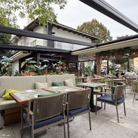 Outdoor seating area  at Restavracija Al Fresco in Bled