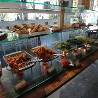 blurry photo of the food set-up at 9 Warung in Ubud