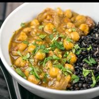 Wild rice ,curry and coconut 🥥 chickpea, plantain and fresh herbs 🌿 stir fry veggies with soup of the day🍲 or salad  🥗  at Chef W Vegan Lunchbox in Nassau