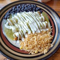 Brussel sprout and sweet  potato enchiladas with cashew cream! at Dos Perros in Durham