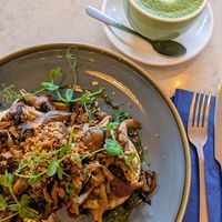 Mushrooms on crumpets and matcha latte at Coffika in Sheffield