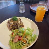 Vegan moussaka and freshly squeezed orange juice  at Prem Bistro and Cafe in Ho Chi Minh City