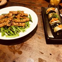 Eggplant rolls, stir fried kale & tempeh  at Prem Bistro and Cafe in Ho Chi Minh City
