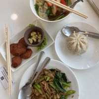 Wonton soup, bao bun, noodle dish and fish cakes   at The Rice and Healthy Food ข้าวทิพย์ แอนด์ เฮลท์ฟู้ด in Bangkok
