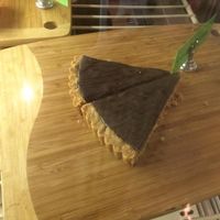 DELICIOUS Chocolate Walnut Tart! House made. Chocolate so smooth on top of a layer of chocolate chunks, crushed walnuts and terrific crust!  at Bloom Cafe in Los Angeles