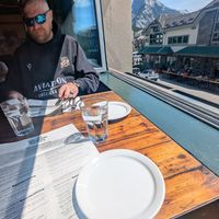 Table with open window view at The Old Spaghetti Factory in Banff