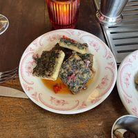  Crispy garlic chive cakes — so friggen tasty   at Eliza in Kingston