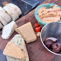 We started chowing the vegan food plate before I remembered to take the photo. So good!  at Wine Down on Main in Brevard