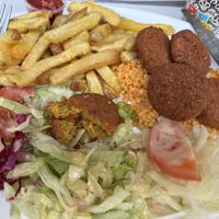 Falafel plate, fries, bulgur wheat, and salad  at Galatasaray Kebab in Arras