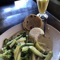 green curry with rice and green veggies. Pineapple agua. (i asked for corn tortillas because i can’t eat the pitta it comes with)  at Clover in San Pedro La Laguna