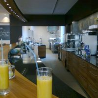 Counter and kitchen (not shown: tables). at Bistro Viva in Trier