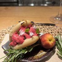 beet hummus bao  at Juntos Farm  in Ibiza