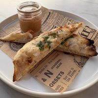 Complimentary Maltese Ħobża bread with traditional Biggilla (broad bean) dip.   at Pontus Restaurant in Zebbug