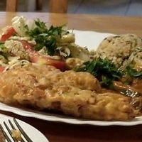 Fried leek, fresh salad and rice at Vege Club Amar in Szczecin