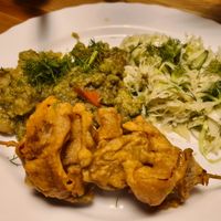 Lentils and potato's with battered veg skewer at Vege Club Amar in Szczecin
