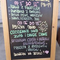 Vege Club Amar outdoor sign with 4 different breakfast options  at Vege Club Amar in Szczecin