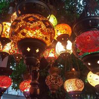 Lights hanging in tree. at Mozaik Bahce in Fethiye