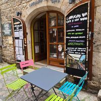 Entrance at the back street at l'Abracada bar in Gorges Du Tarn Causses