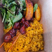 The BBQ platter with plantains. at Casa Borinqueña in Philadelphia