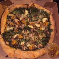 Seasonal veggie pizza...sooo good! Excuse the poor car lighting, haha. at Seedz Cafe in St Louis