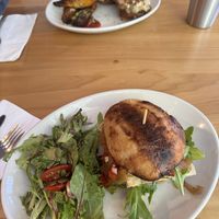 Italian Tempeh Sandwich w/ side salad & Seedz Reuben w/ potato wedges .  at Seedz Cafe in St Louis
