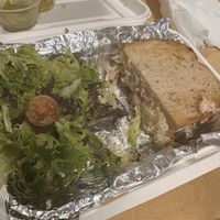 Half of The Famous Reuben (New) with a side saladd  at Seedz Cafe in St Louis